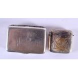 AN ANTIQUE VESTA CASE and a silver snuff box. 55 grams. Largest 5.5 cm x 3.75 cm. (2)