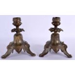 A PAIR OF 19TH CENTURY FRENCH BRONZE CANDLESTICKS formed with leaves. 15 cm x 8 cm.