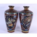 A LARGE PAIR OF 19TH CENTURY JAPANESE MEIJI PERIOD CLOISONNE ENAMEL VASES decorated with figures and