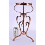 AN ART NOUVEAU COPPER STAND in the manner of Benson, of scrolling organic form. 40 cm x 18 cm.