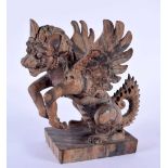 AN UNUSUAL SOUTH EAST ASIAN CARVED COROMANDEL FIGURE OF A BEAST modelled upon a square base. 18 cm x