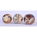 AN UNUSUAL SET OF THREE 19TH CENTURY JAPANESE MEIJI PERIOD SATSUMA OJIME painted with figures,