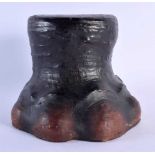 AN UNUSUAL 19TH CENTURY COUNTRY HOUSE LEATHER AND HIDE DOOR STOP formed as an elephants foot. 18