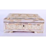 AN EARLY 20TH CENTURY CONTINENTAL CARVED MOTHER OF PEARL CASKET depicting birds and foliage. 18 cm x