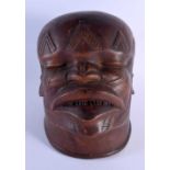 A GOOD EARLY 20TH CENTURY AFRICAN TRIBAL MAKONDE LIPIKO WOOD MASK used by an elder to celebrate