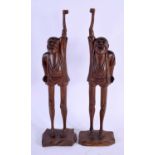 A LARGE PAIR OF 19TH CENTURY JAPANESE MEIJI PERIOD CARVED WOOD FIGURES OF ASHINAGATENAGA modelled