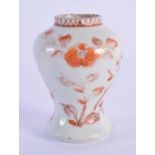 A 17TH CENTURY CHINESE IRON RED PAINTED PORCELAIN VASE Kangxi, painted with flowers. 7.5 cm high.