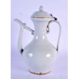 A CHINESE WHITE MONOCHROME POTTERY EWER probably Yongle period, of elegant form with slender