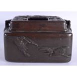 A 19TH CENTURY JAPANESE MEIJI PERIOD SILVER INLAID BRONZE CENSER AND COVER decorated in relief