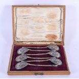 SIX 19TH CENTURY RUSSIAN SILVER AND ENAMEL SPOONS in original case. 88 grams. 11.25 cm x 2.5 cm. (