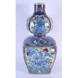 A LARGE 16TH/17TH CENTURY CHINESE IRON RED BLUE AND WHITE SQUARE FORM VASE Ming, painted with
