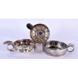 THREE ANTIQUE CONTINENTAL WHITE METAL WINE TASTERS. 214 grams. Largest 10 cm x 7.5 cm. (3)