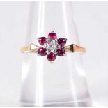 AN 18T GOLD RUBY AND DIAMOND RING. 2.3 grams. N.