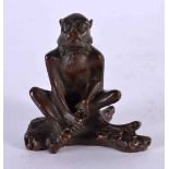 A JAPANESE BRONZE MONKEY OKIMONO. 6 cm x 6 cm.