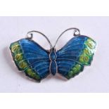 A SILVER AND ENAMEL BROOCH. 14 grams. 3 cm x 5 cm.