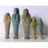 A group of Egyptian glazed pottery Sarcophagus figures. Largest 16cm (5).