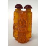 A CHINESE CARVED AMBER SNUFF BOTTLE 20th Century. 5 cm x 3 cm.