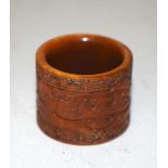 A CHINESE BONE ARCHERS RING 20th Century. Z. 3 cm x 2.5 cm.