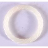 A CHINESE WHITE JADE TWIST BANGLE 20th Century. 8 cm diameter.