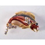 AN ENAMELLED FISH BROOCH. 11 grams. 4.25 cm x 2.75 cm.