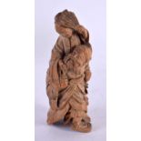 AN 18TH/19TH CENTURY CHINESE CARVED BAMBOO FIGURE OF A MALE Qing, modelled holding a fan. 9 cm x 3