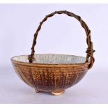 A JAPANESE RAKU TYPE STONEWARE BASKET. 15.5 cm wide.