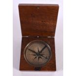 AN ANTIQUE POCKET COMPASS. 8 cm square.