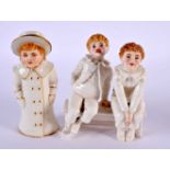 Royal Worcester rare figure of two boys seated on a bench and a rare candlesnuffer of a boy with a