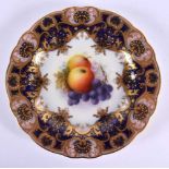 Royal Worcester plate painted with fruit, apple and grapes, under a cobalt blue and highly gilt