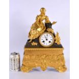 A 19TH CENTURY FRENCH GILT BRONZE MANTEL CLOCK formed with a figure. 40 cm x 22 cm.