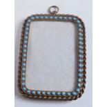 AN ANTIQUE TURQUOISE FRAME. 86 grams. 11 cm x 8 cm.