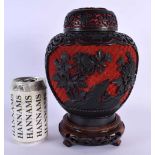 AN EARLY 20TH CENTURY CHINESE TWO COLOUR CINNABAR LACQUER GINGER JAR AND COVER Late Qing/Republic.