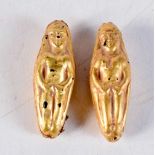 A PAIR OF ANTIQUE HIGH CARAT GOLD MIDDLE EASTERN TOGGLES. 7.6 grams. 4 cm x 1.25 cm.