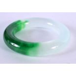 A CHINESE JADEITE BANGLE 20th Century. 8.5 cm diameter.