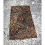 A small Oriental prayer rug 121 x 68 cm.