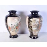 A pair of Japanese Satsuma vases decorated with females in various pursuits. 30cm (2).