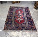 A Turkish rug 210 x 123 cm.