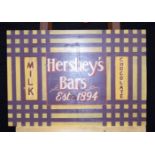 A painted Hershey's Chocolate advertising board on wood. 54 x 78cm.