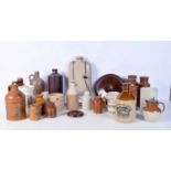 A collection of small stone ware pots and flasks largest 26 cm(Qty).