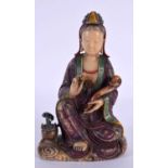 A LATE 19TH CENTURY CHINESE POLYCHROMED SOAPSTONE FIGURE OF GUANYIN Qing, modelled upon a rui