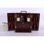 AN EARLY VICTORIAN MAHOGANY APOTHECARY SET with partial contents. 24 cm x 18 cm closed.