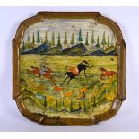 A 19TH CENTURY MIDDLE EASTERN ISLAMIC CARVED AND PAINTED LACQUER TRAY painted with hunting scenes