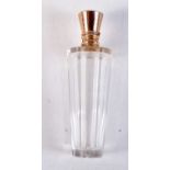 AN ANTIQUE 18CT GOLD TOPPED GLASS SCENT BOTTLE. 35.7 grams. 9 cm high.