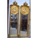 A pair of gilt framed Baroque style mirrors 178 x 46 cm (2).