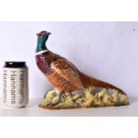 A Beswick pheasant 20x25cm.