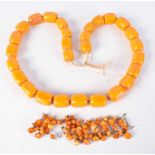 A large Amber TYPE necklace together with a bracelet 102 cm
