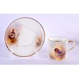 Royal Worcester coffee can and saucer painted with teal and partridge by Jas. Stinton, signed,