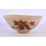 A 19TH CENTURY JAPANESE MEIJI PERIOD SATSUMA BOWL painted with flowers. 16 cm diameter.