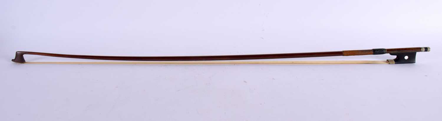 A GERMAN VIOLIN BOW by Friedrich Glass. 74 cm long.