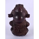 A JAPANESE CARVED BOXWOOD STANDING TOAD NETSUKE. 6 cm x 3 cm.